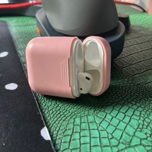 Apple AirPods. Replacement case and replacement right earbud.